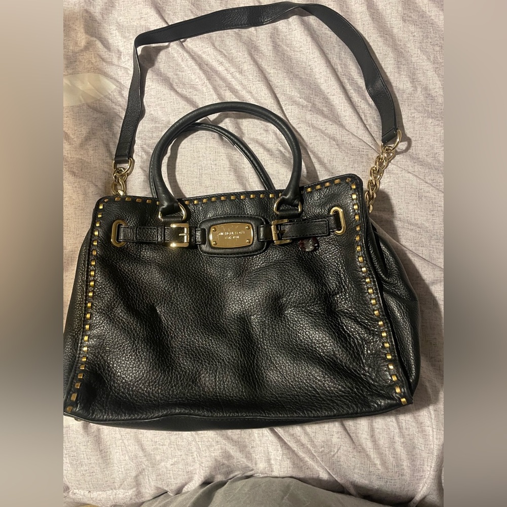 Micheal Kors Black purse negotiable
